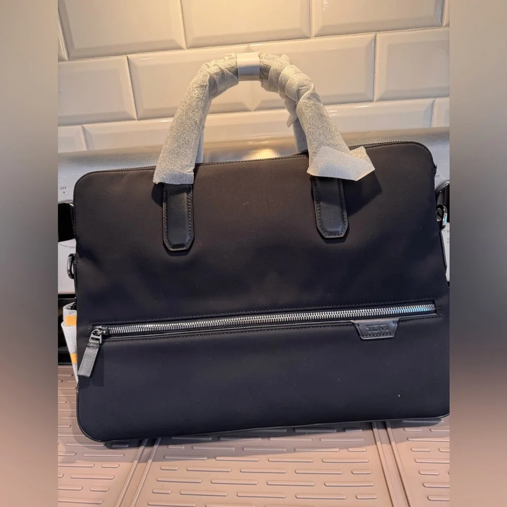 TUMI Tower Portfolio Brief - HARRISON